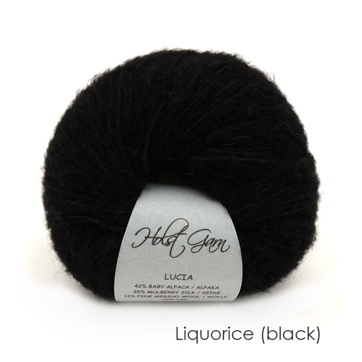 A skein of Holst Lucia alpaca, silk, merino, yak in color Liquorice from Inspire A mind yarn shop.