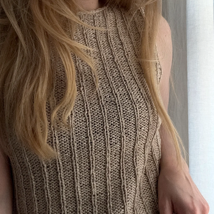 woman wearing a Taupe colored knitted Granular top by aegyoknit 