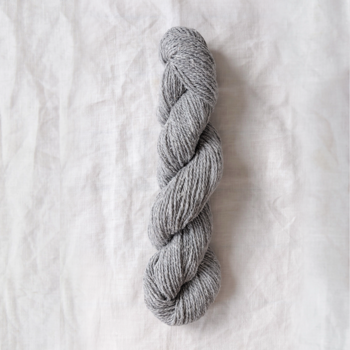 skein of Quince & Co Wren in light grey- paluxy